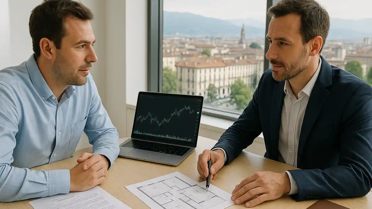 Покупка недвижимости в Италии за криптовалюту: встреча инвестора с консультантом в современном офисе Русскоязычный инвестор и консультант по недвижимости сидят за столом в светлом современном офисе в Италии, обсуждают покупку квартиры с использованием средств из криптовалюты, на столе лежат документы, план квартиры и открыт ноутбук с графиком